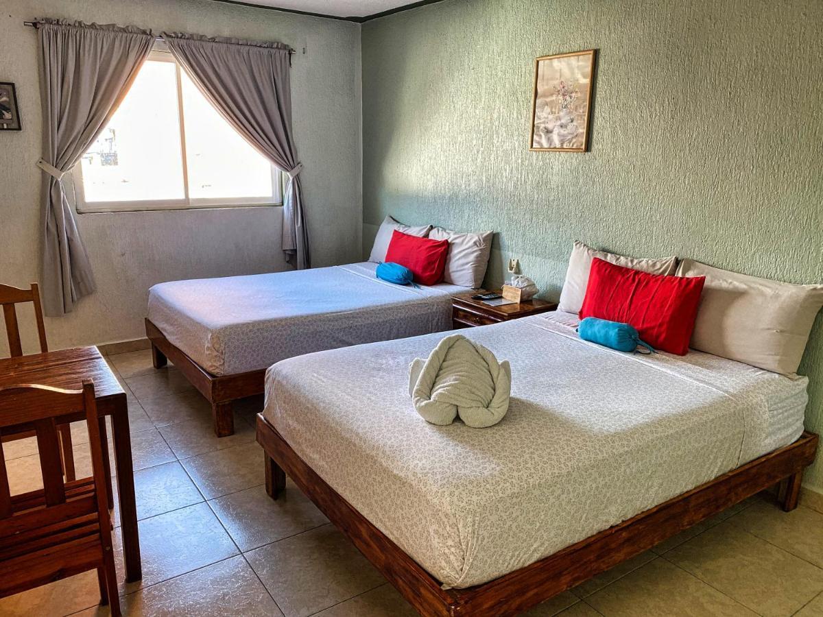 Posada Paso Del Sol إيسلا موخيريس المظهر الخارجي الصورة