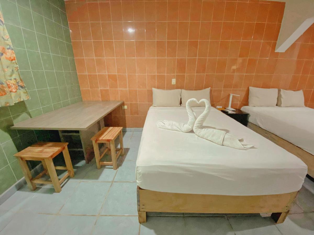 Posada Paso Del Sol إيسلا موخيريس المظهر الخارجي الصورة