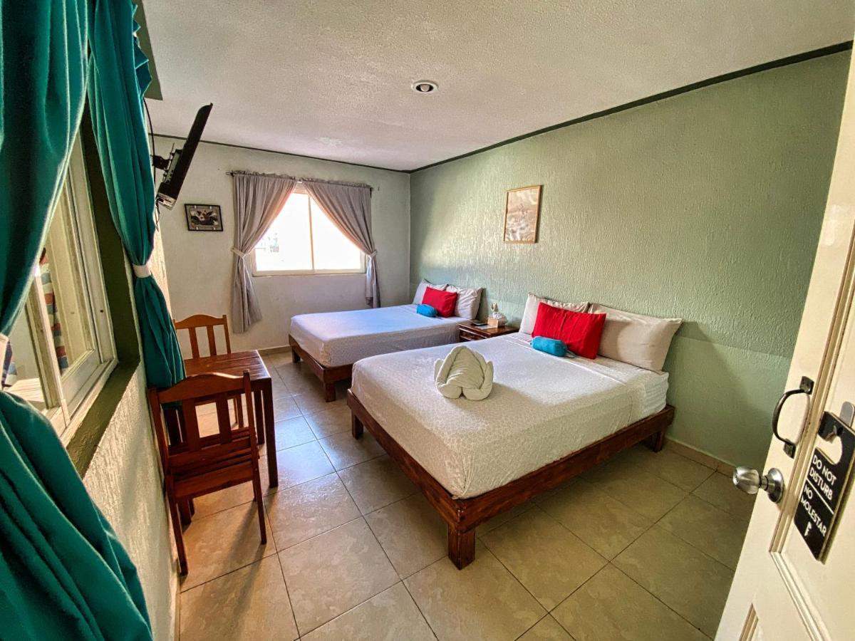 Posada Paso Del Sol إيسلا موخيريس المظهر الخارجي الصورة