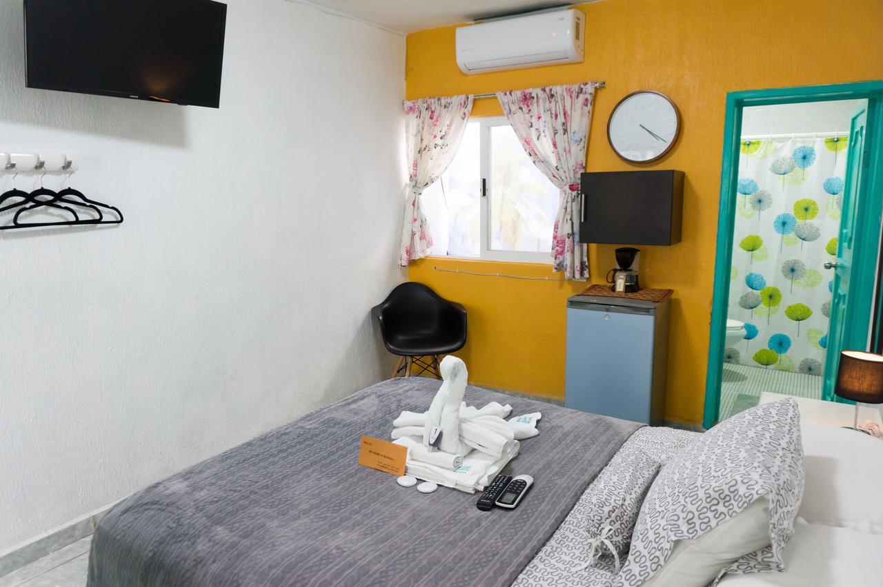 Posada Paso Del Sol إيسلا موخيريس المظهر الخارجي الصورة