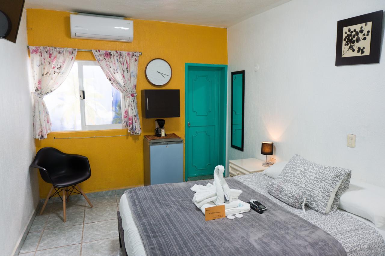 Posada Paso Del Sol إيسلا موخيريس المظهر الخارجي الصورة