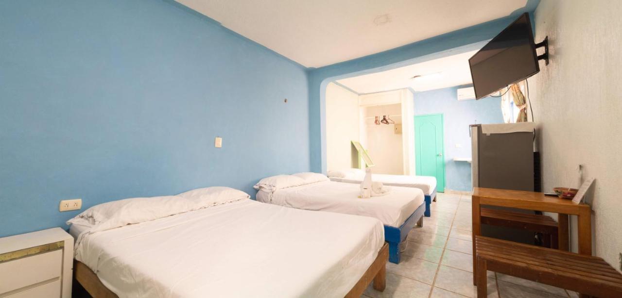 Posada Paso Del Sol إيسلا موخيريس المظهر الخارجي الصورة